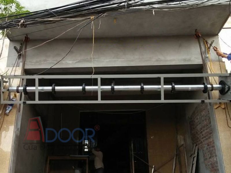 Lắp đặt trục cửa cuốn