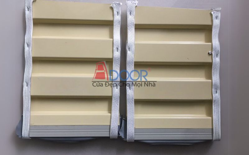 Thân cửa cuốn Adoor làm từ hợp kim nhôm 6063-T5, phủ sơn tĩnh điện chống ăn mòn