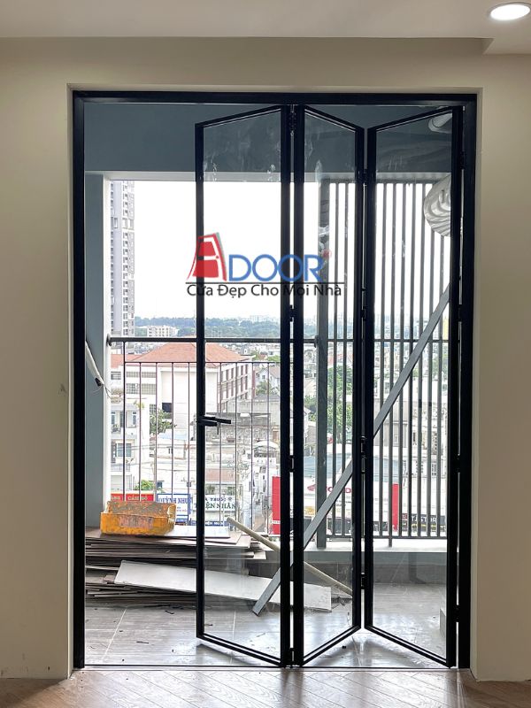 Cửa nhôm slim xếp trượt Adoor đang được xếp gọn sang một bên, tạo lối đi rộng rãi