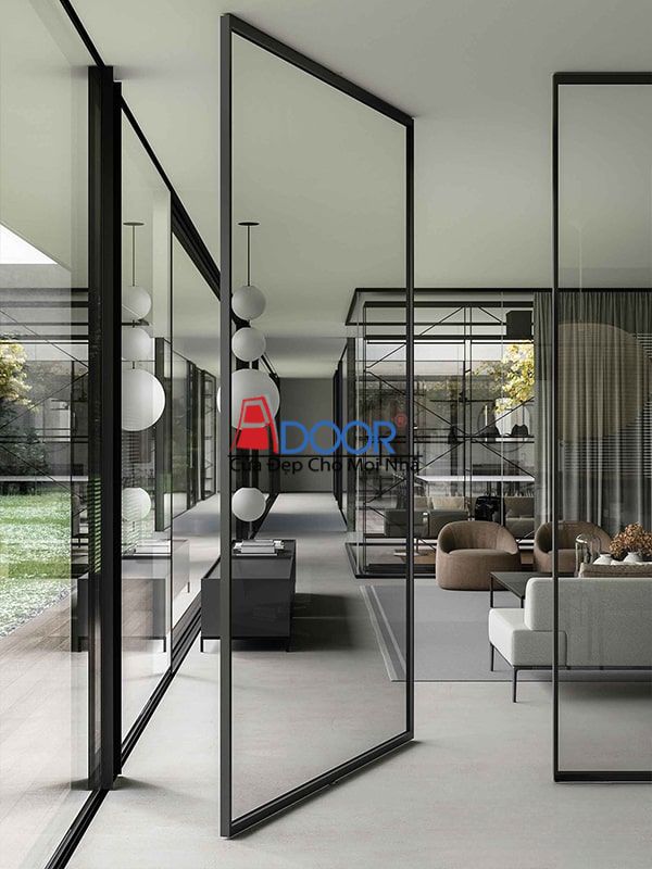 Cửa pivot cao cấp có thiết kế xoay trục hiện đại, tạo điểm nhấn độc đáo cho công trình