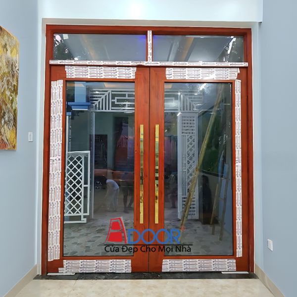 Mẫu cửa nhôm kính thủy lực Adoor khuôn bao đơn tạo vẻ thanh thoát và hiện đại cho không gian