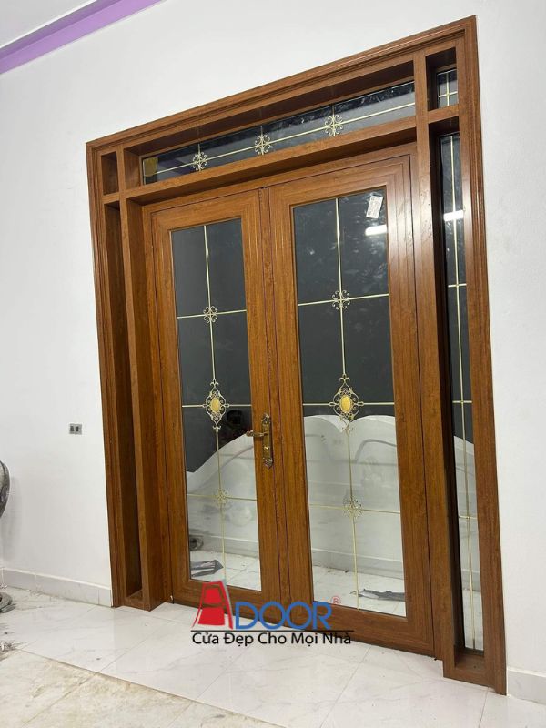 Cửa thủy lực 2 cánh kết hợp vách kính cố định tạo không gian mở và hiện đại
